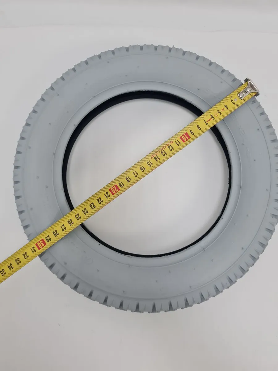 Покрышка колеса 12 1/2х2 1/4" (310 х 55мм) 57Х203 серая